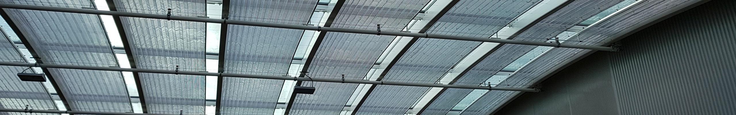 rond scherm in plafond van hal