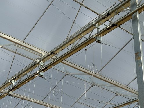 schermdoek installatie in nok van kas